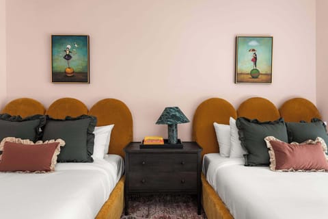 Bedroom 1: Two Queen Beds, Smart TV + Full ensuite Bathroom