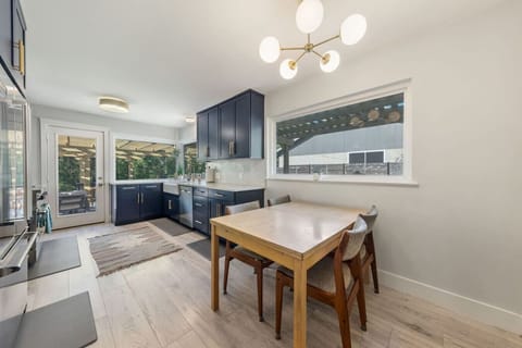 Casual seating for four, steps from the farmhouse sink.