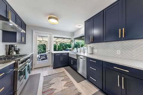 Cook with a view, door opens straight to the covered patio.