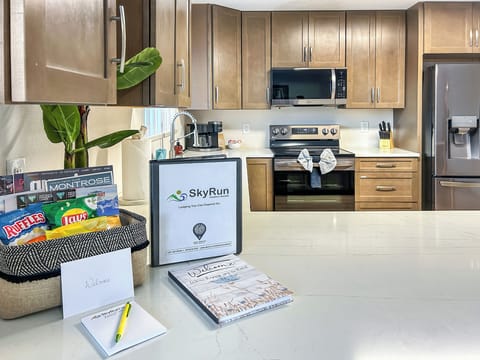 Your fully equipped kitchen features modern appliances and thoughtful welcome touches, perfect for preparing meals during your stay.