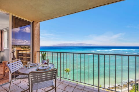 Private oceanfront lanai overlooking Crystal-clear waters with a spectacular backdrop of the West Maui Mountains.