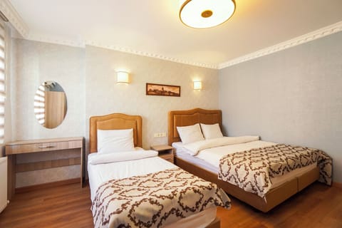 Family Duplex, 4 Bedrooms, City View | Iron/ironing board, free WiFi