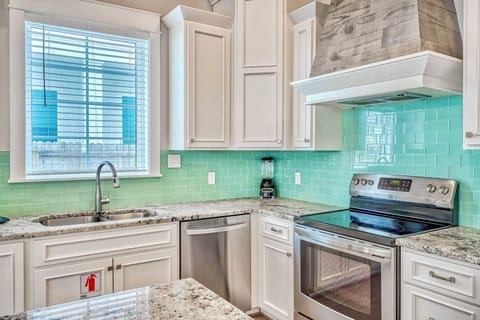 1st Floor - Spacious gourmet kitchen fully stocked with all the cookware and essentials the family chef needs. Enjoy modern appliances, generous prep space, and an open layout perfect for preparing meals, hosting gatherings, and entertaining with ease.
