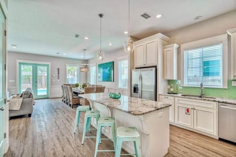 1st Floor - Spacious gourmet kitchen fully stocked with all the cookware and essentials the family chef needs. Enjoy modern appliances, generous prep space, and an open layout perfect for preparing meals, hosting gatherings, and entertaining with ease.
