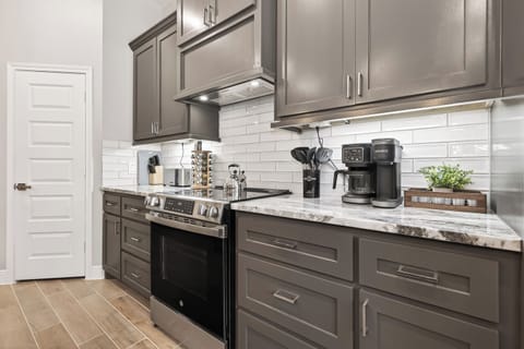 Thoughtfully stocked kitchen designed for both everyday cooking and entertaining