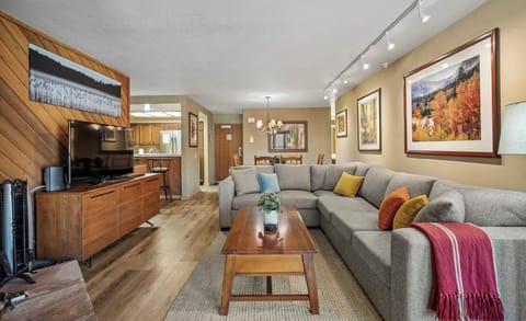 Open floor plan, natural light, and beautiful floors makes this a nice retreat.