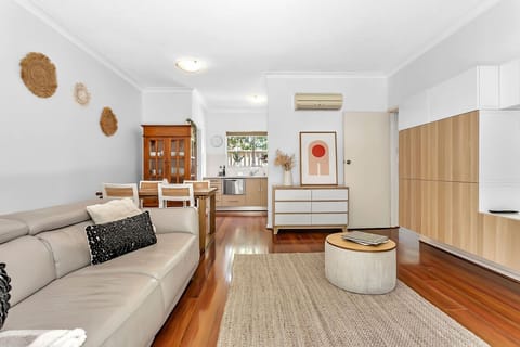 Relax in our bright, open-plan living area—the perfect spot to unwind after a day of exploring.
