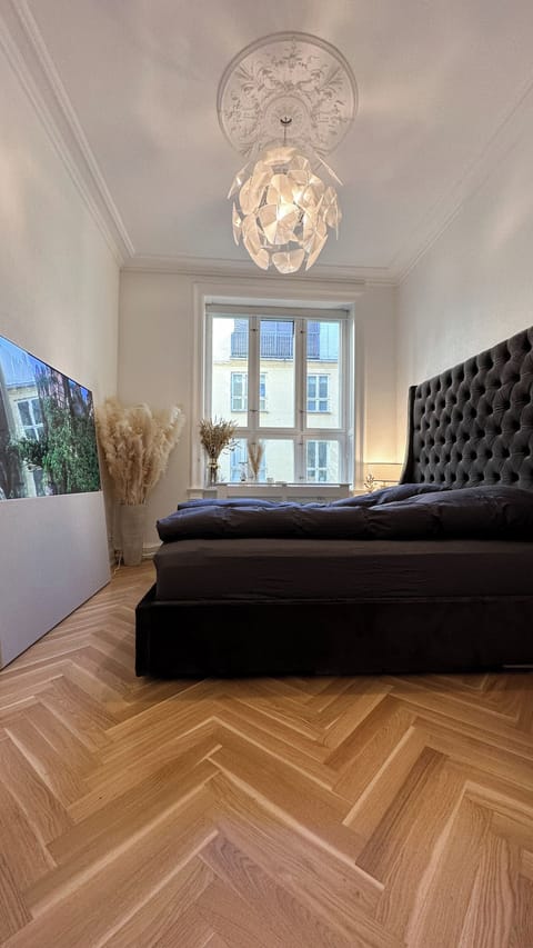 Bedroom 1 and Bedroom 2 are similar in layout, and each featuring identical beds