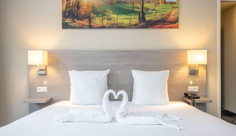 Sink into crisp linens with a romantic welcome on arrival