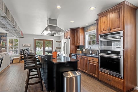 Open living room, kitchen, and dining with plenty of seating for everyone!