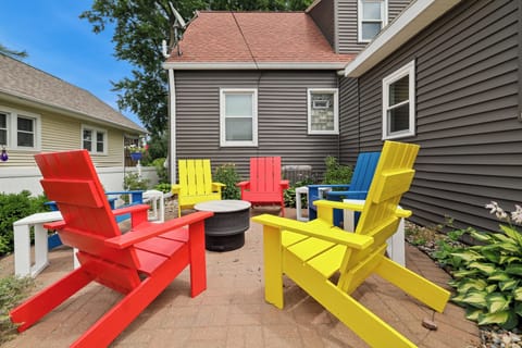 Backyard fire pit patio - pull up an Adirondack chair and relax.