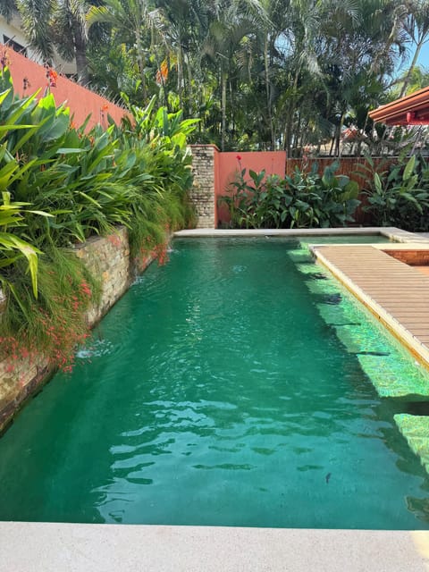 Pool with waterfall feature