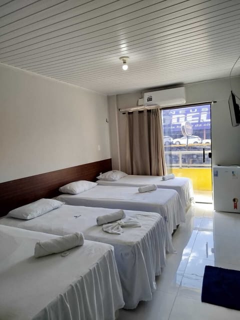 Standard Quadruple Room, City View | Desk, laptop workspace, free WiFi
