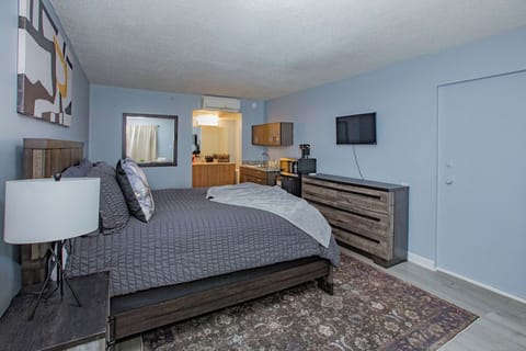 Plush Queen Bed in a studio apartment