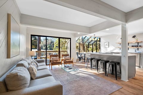 Another angle of the family room, dining, and kitchen.