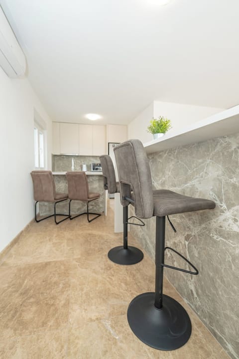 Standard Studio, Sea View, Ground Floor | Living area | 45-inch flat-screen TV with cable channels