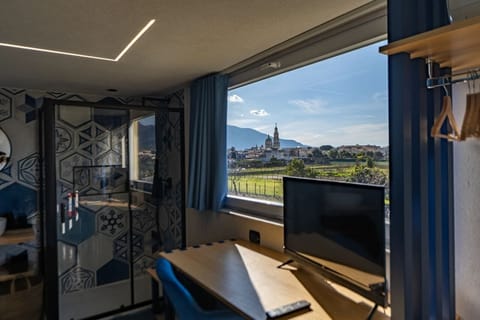 Double Room, 1 Queen Bed, Private Bathroom, Mountain View | Desk, laptop workspace, blackout drapes, iron/ironing board