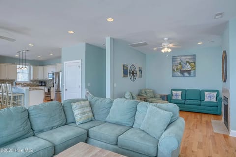 Spacious living room with plenty of seating for the whole family