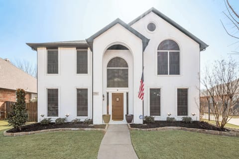 Beautiful two-story home with charming curb appeal, located in a quiet and welcoming Keller neighborhood.