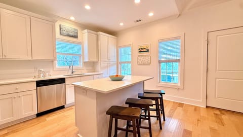 Kitchen island and view looking towards street.