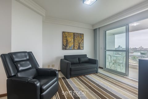 Basic Apartment | Living area | 32-inch Smart TV with digital channels
