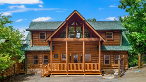 Your mountain escape starts here! Rustic log cabin charm meets wraparound porch relaxation — kick back and soak in the view.
