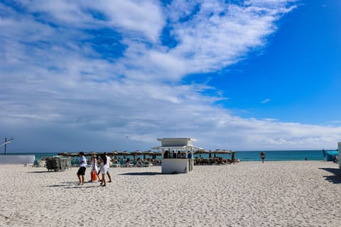 On the beach, white sand