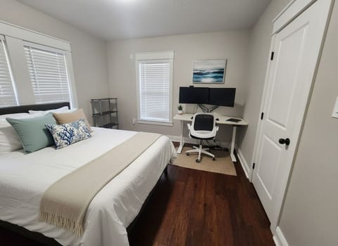 Bedroom #2: queen sized bed with Smart Tv, Storage for clothing and monitors!