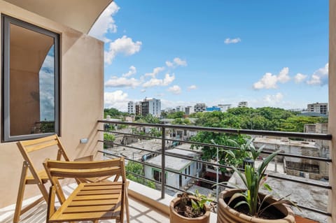Enjoy views of the city from the private balcony!