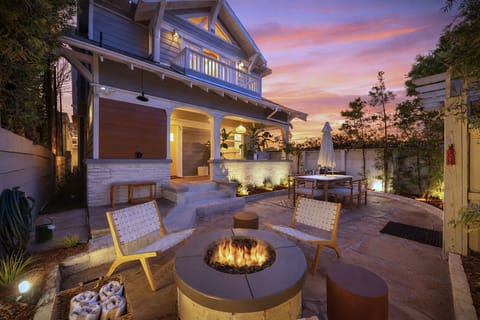 Golden-hour fire pit hangs in your private outdoor oasis.