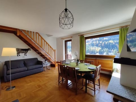 Apartment, Balcony, Mountain View | Living area | 23-inch Smart TV with cable channels