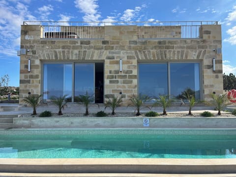 Amenities, Building Exterior, Garden, Outdoor, Pool, Spring, Summer, Wellness