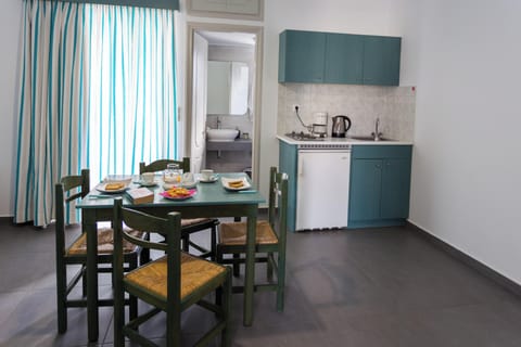 Apartment, 1 Bedroom, Sea View | Living area | 27-inch LCD TV with cable channels