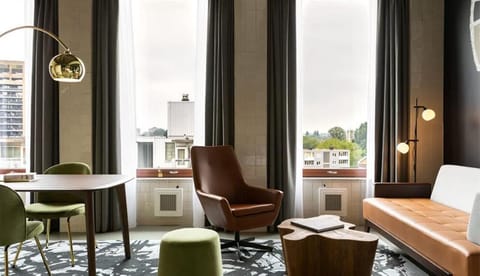 Lounge by the windows with coffee and a good book.