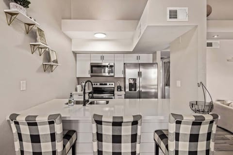 Fully stocked kitchen with modern appliances, cookware, and all essentials to prepare your favorite meals.