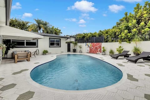 Private pool with lounge seating and outdoor BBQ