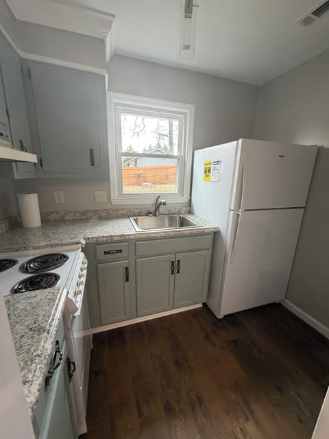 Fully equipped kitchenette in the in-law suite for guest convenience.