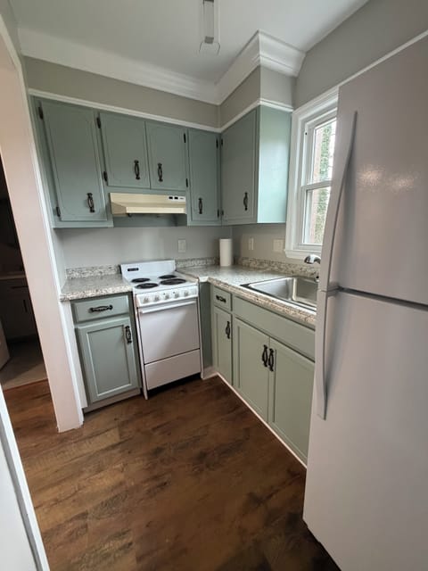 Fully equipped kitchenette in the in-law suite for guest convenience.