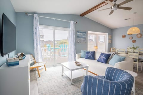 2 Pleasant, Light Filled Living Rooms Connected by a Huge Sun Deck (Right Side shown)
