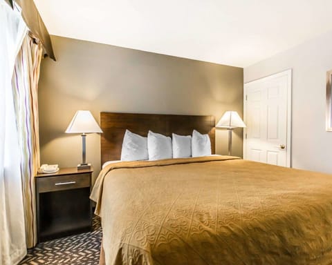 Desk, blackout drapes, iron/ironing board, free cribs/infant beds