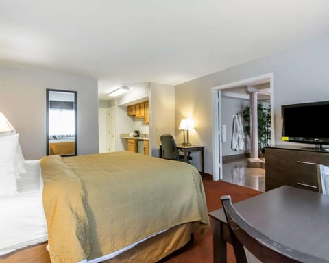 Desk, blackout drapes, iron/ironing board, free cribs/infant beds