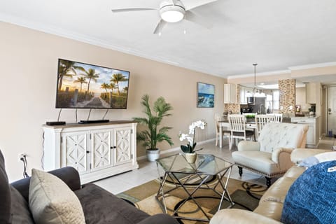 Bright & airy living room with smart TV to watch your favorite TV shows & movies