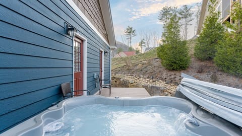 Private hot tub on the patio, located just outside the bedrooms.