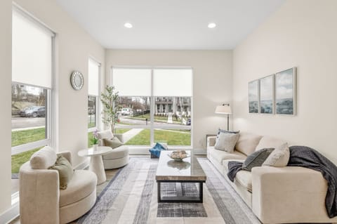 Enjoy a cup of coffee or a good conversation in this bright and airy living area