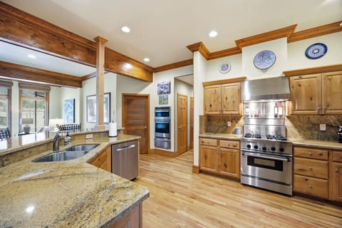 Chef’s Kitchen: Spacious Kitchen Connected to the Open-Concept Living and Dining Area