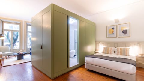 A modern and cozy studio with street views. #CozyVibes #UrbanLiving