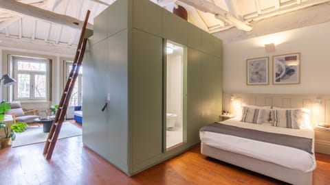 Cozy bedroom with a minimalist design and high ceilings.. #CozyVibes #UrbanStay