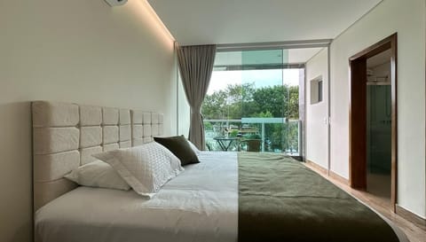 Deluxe Suite, Pool View | In-room safe, free WiFi
