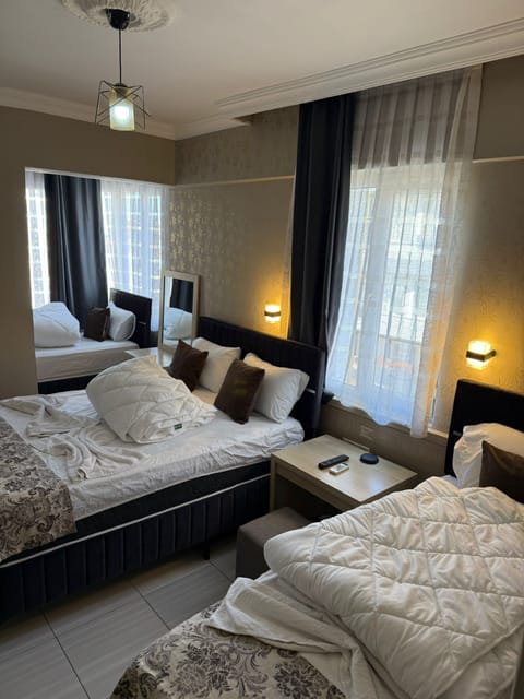 Family Quadruple Room | Frette Italian sheets, premium bedding, down comforters, pillowtop beds
