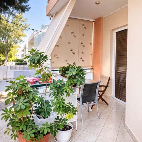 Private Balcony Entrance Surrounded by Lush Greenery